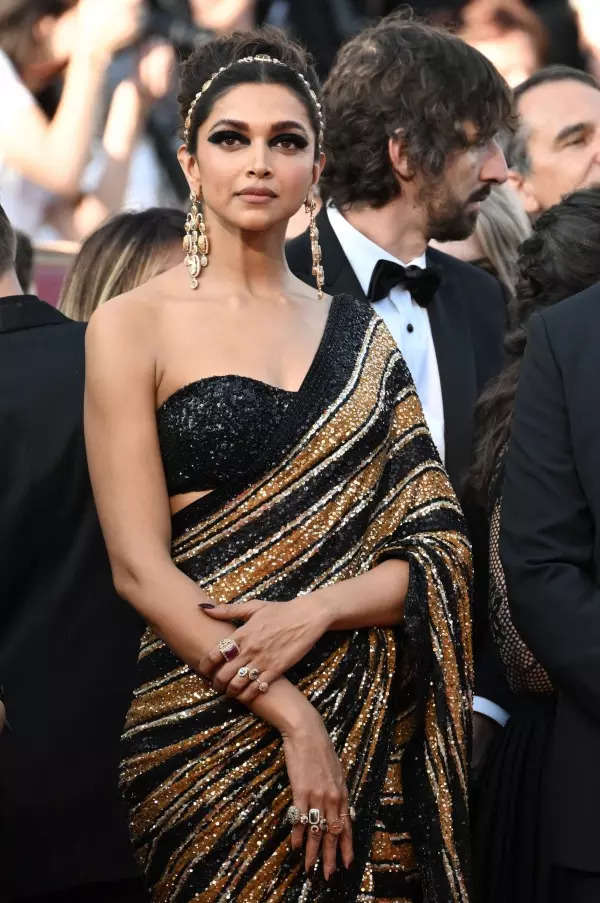 Cannes 2022: Deepika Padukone exudes celestial grace in white fusion saree as she signs off from the French Riviera