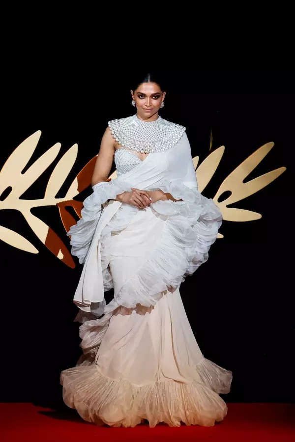 Cannes 2022: Deepika Padukone exudes celestial grace in white fusion saree as she signs off from the French Riviera