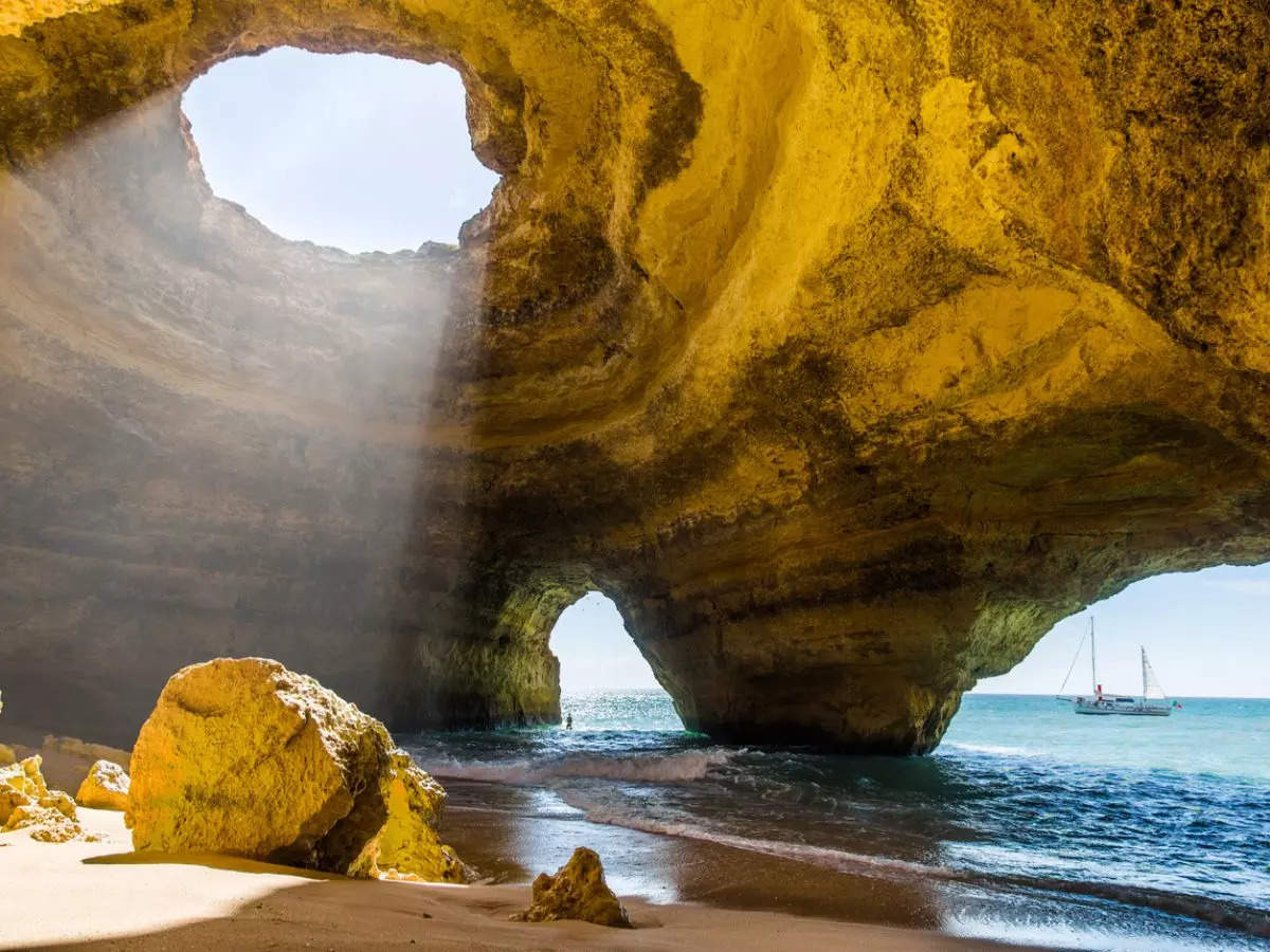 Heaven is hiding right here at this skylit cave in Portugal with a beach!