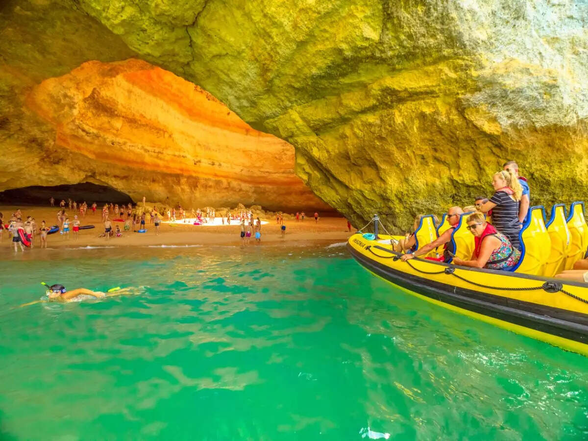 Heaven is hiding right here at this skylit cave in Portugal with a beach!