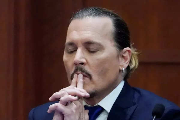 Defamation case: 35 pictures of Johnny Depp and Amber Heard from Virginia court