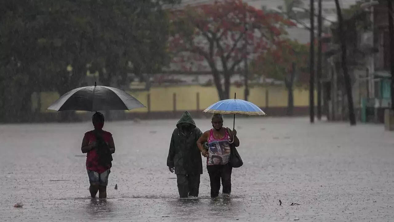 Cuba floods: Several dead as heavy rain hits island, damages dozens of ...