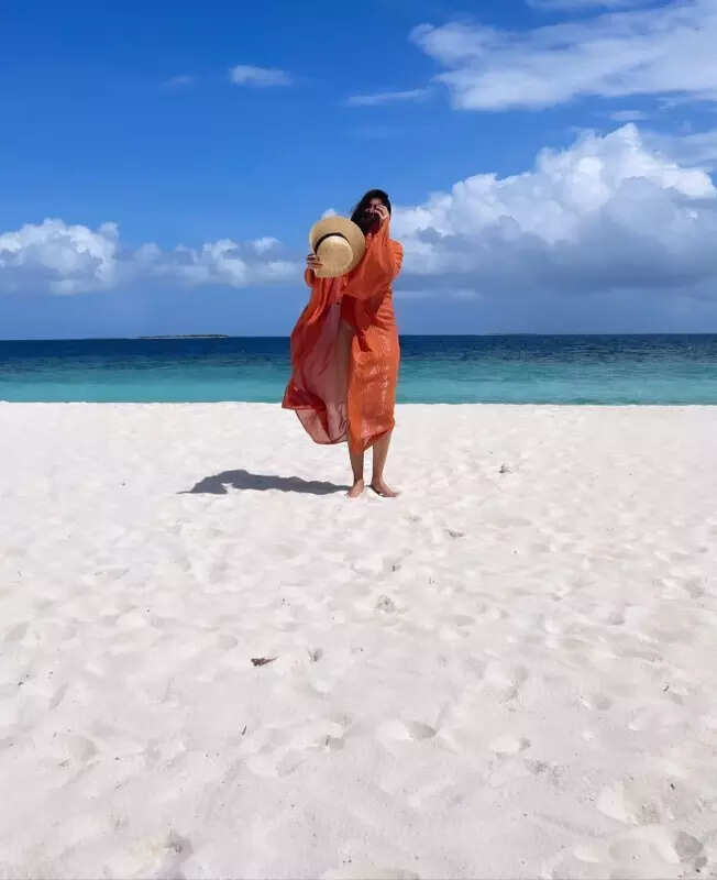 Anushka Sharma makes summer more colourful in orange swimsuit, see beachy snaps