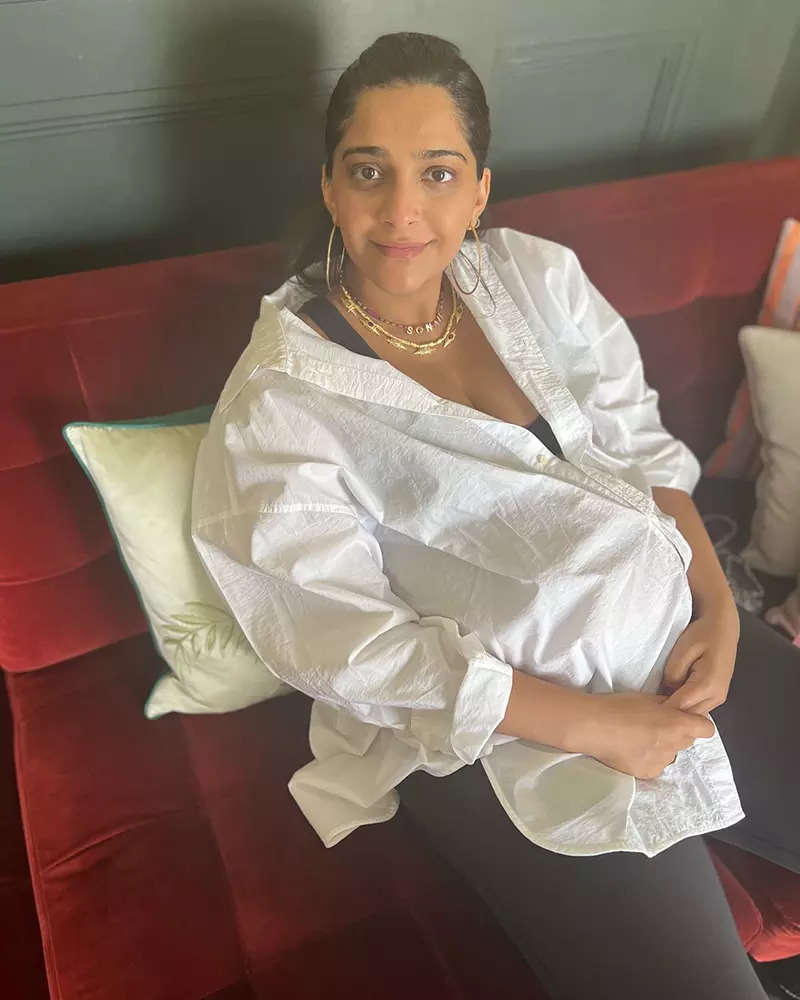 Soon-to-be mommy Sonam Kapoor flaunts her baby bump in an oversized white shirt in these new pictures