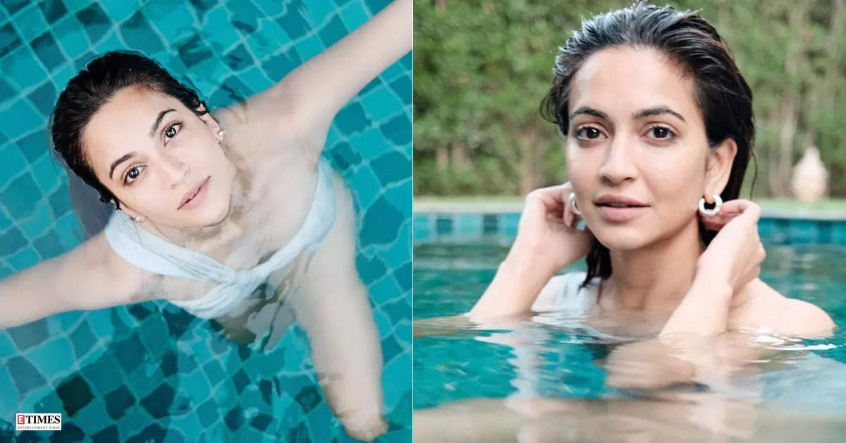 'Shaadi Mein Zaroor Aana' actress Kriti Kharbanda beats the summer heat by enjoying pool time in a monochrome swimsuit