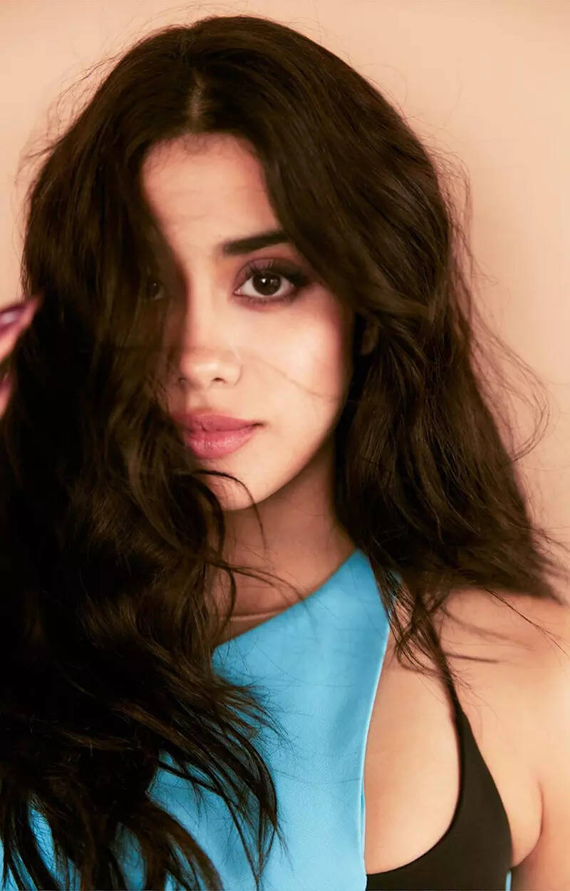 Janhvi Kapoor flaunts her toned midriff in a blue slit dress in these captivating pictures