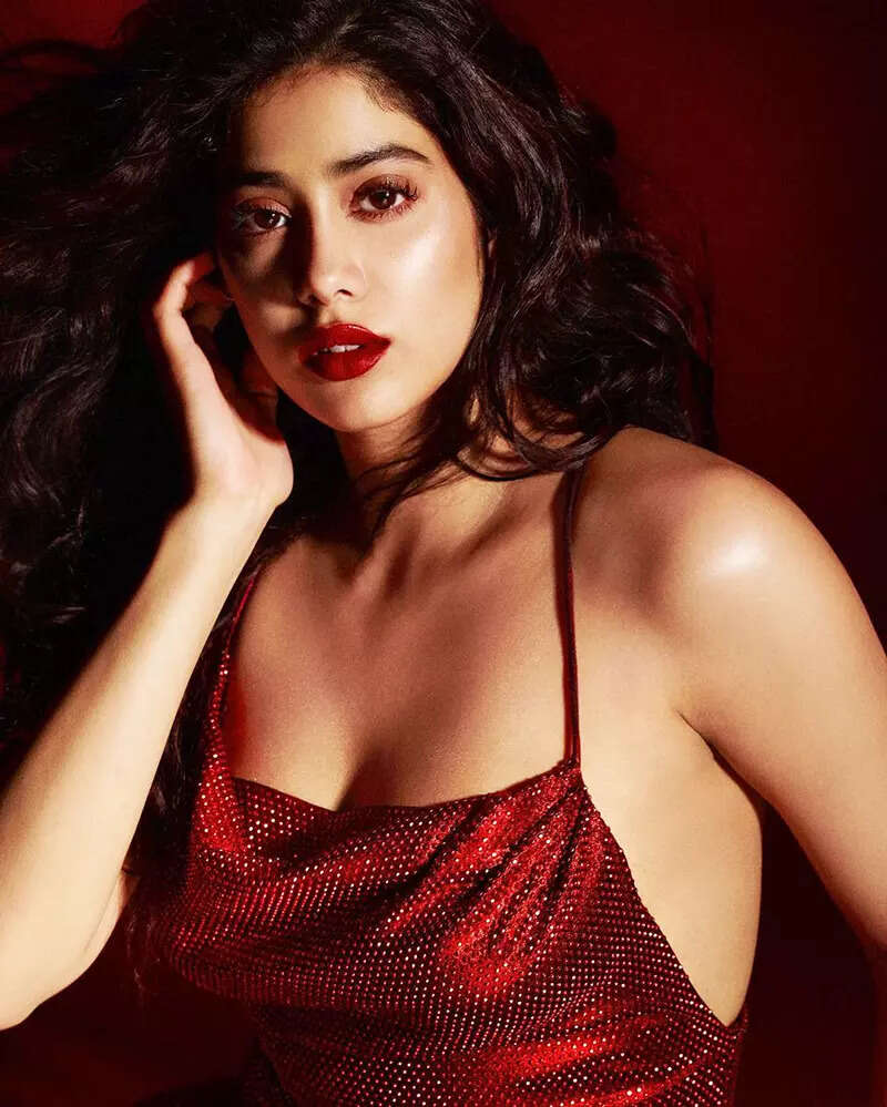 Janhvi Kapoor oozes oomph in a cherry red thigh-high slit backless dress in these gorgeous clicks