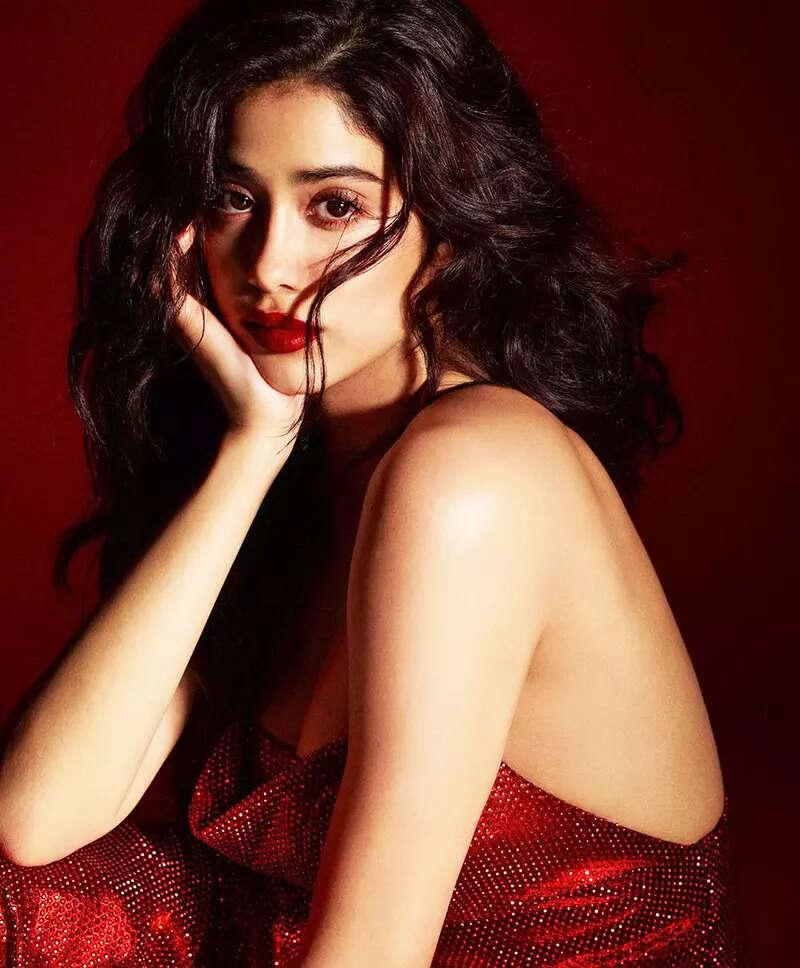 Janhvi Kapoor oozes oomph in a cherry red thigh-high slit backless dress in these gorgeous clicks