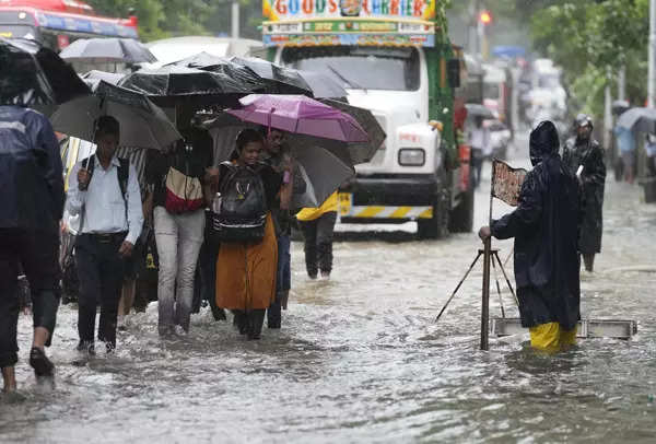 Heavy rain disrupts normal life in Mumbai; see pics