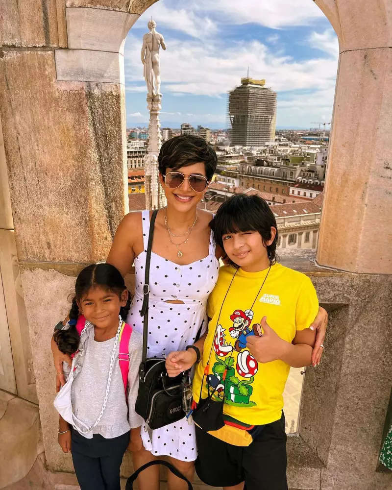 Bikini-clad Mandira Bedi chills in the pool, enjoys vacation with kids in Spain