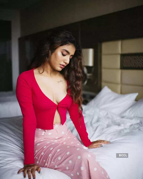 These pictures of 'wink girl' Priya Prakash Varrier in red top with plunging neckline are winning the internet