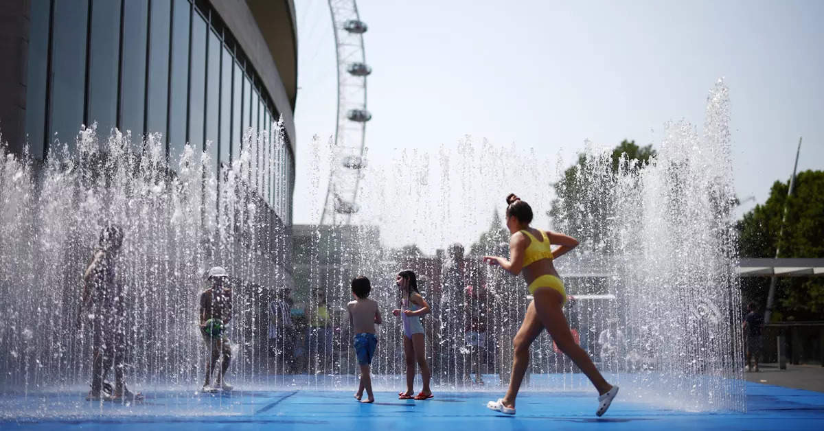 UK residents beat the heat as the country records highest ever temperature; see pics