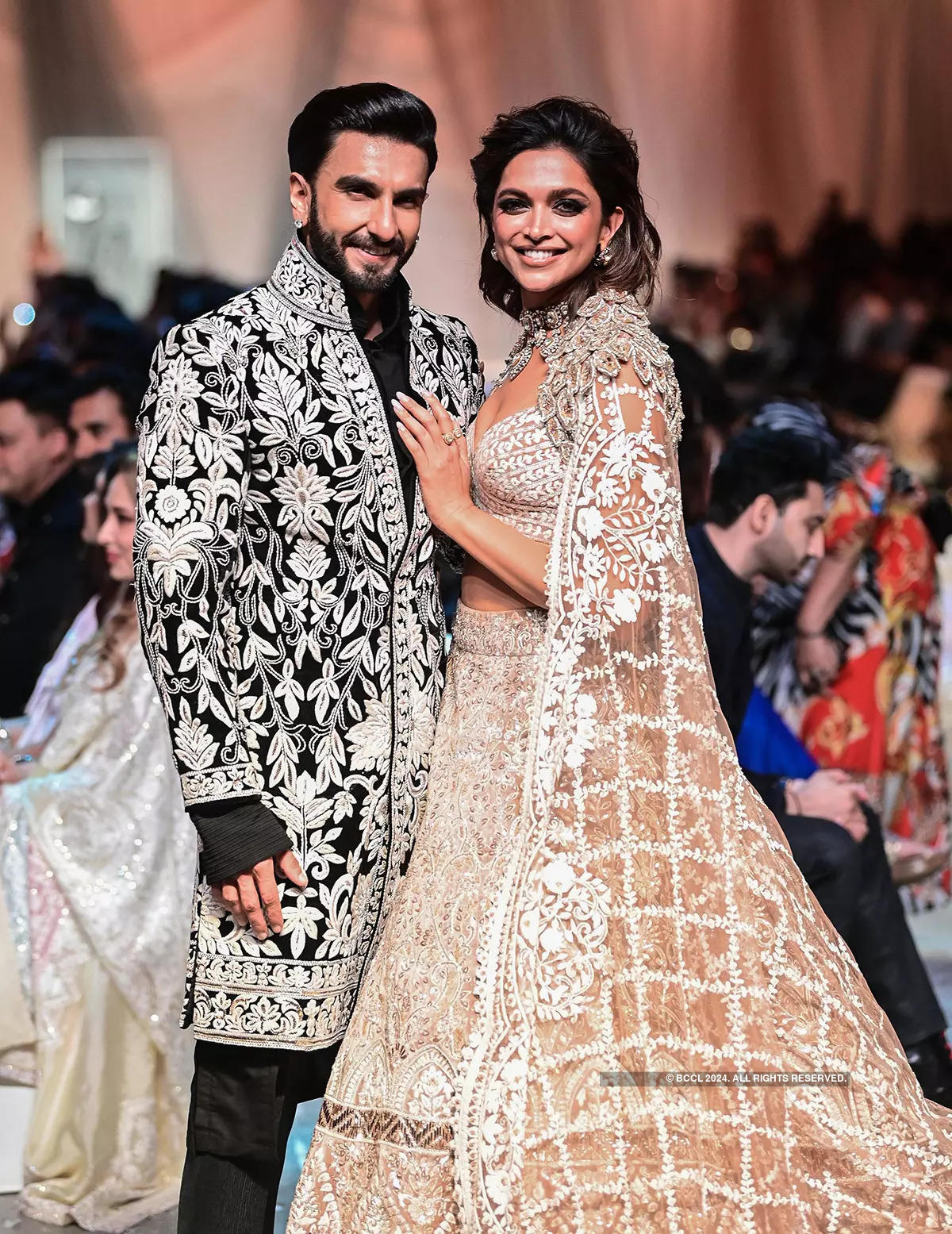 Ranveer Singh & Deepika Padukone walk the ramp for Bollywood designer Manish Malhotra