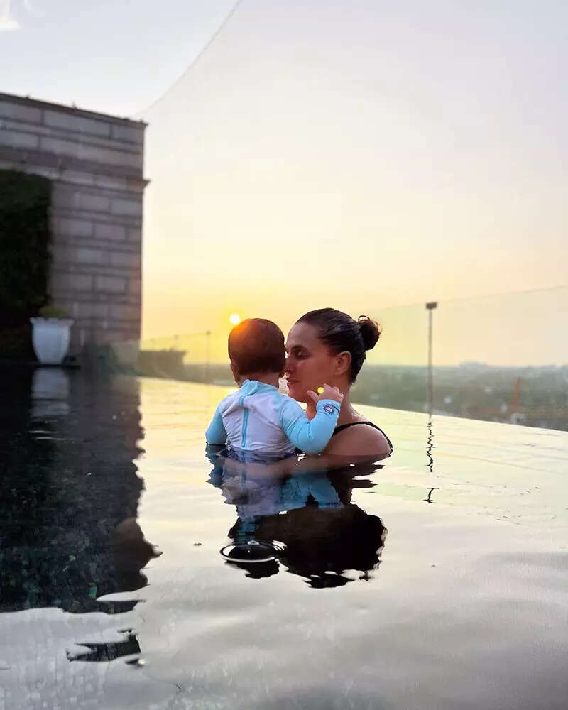 Lovely pictures of Neha Dhupia chilling with her little son in a pool will surely make your day
