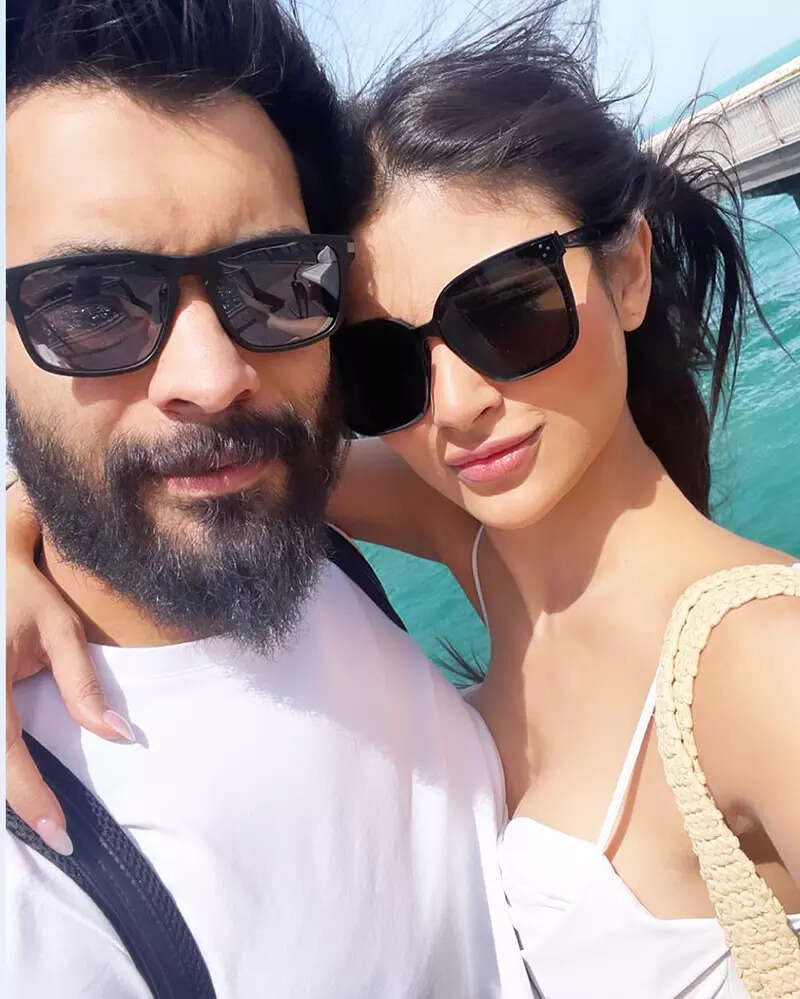 Mouni Roy shares mushy pictures with birthday boy Suraj Nambiar as they chill on a yacht