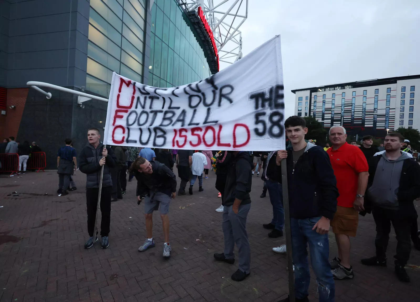 Manchester United supporters protest against team owners