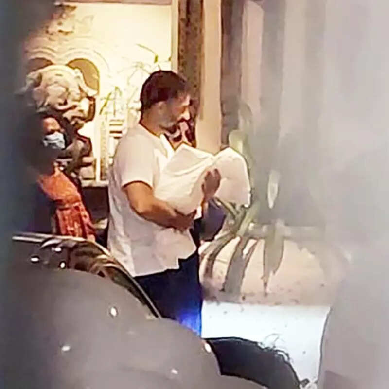 From distributing sweets to warm welcome, pictures of Sonam Kapoor and Anand Ahuja bringing newborn son to home