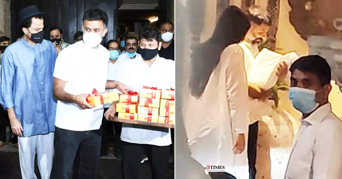 From distributing sweets to warm welcome, pictures of Sonam Kapoor and Anand Ahuja bringing newborn son to home