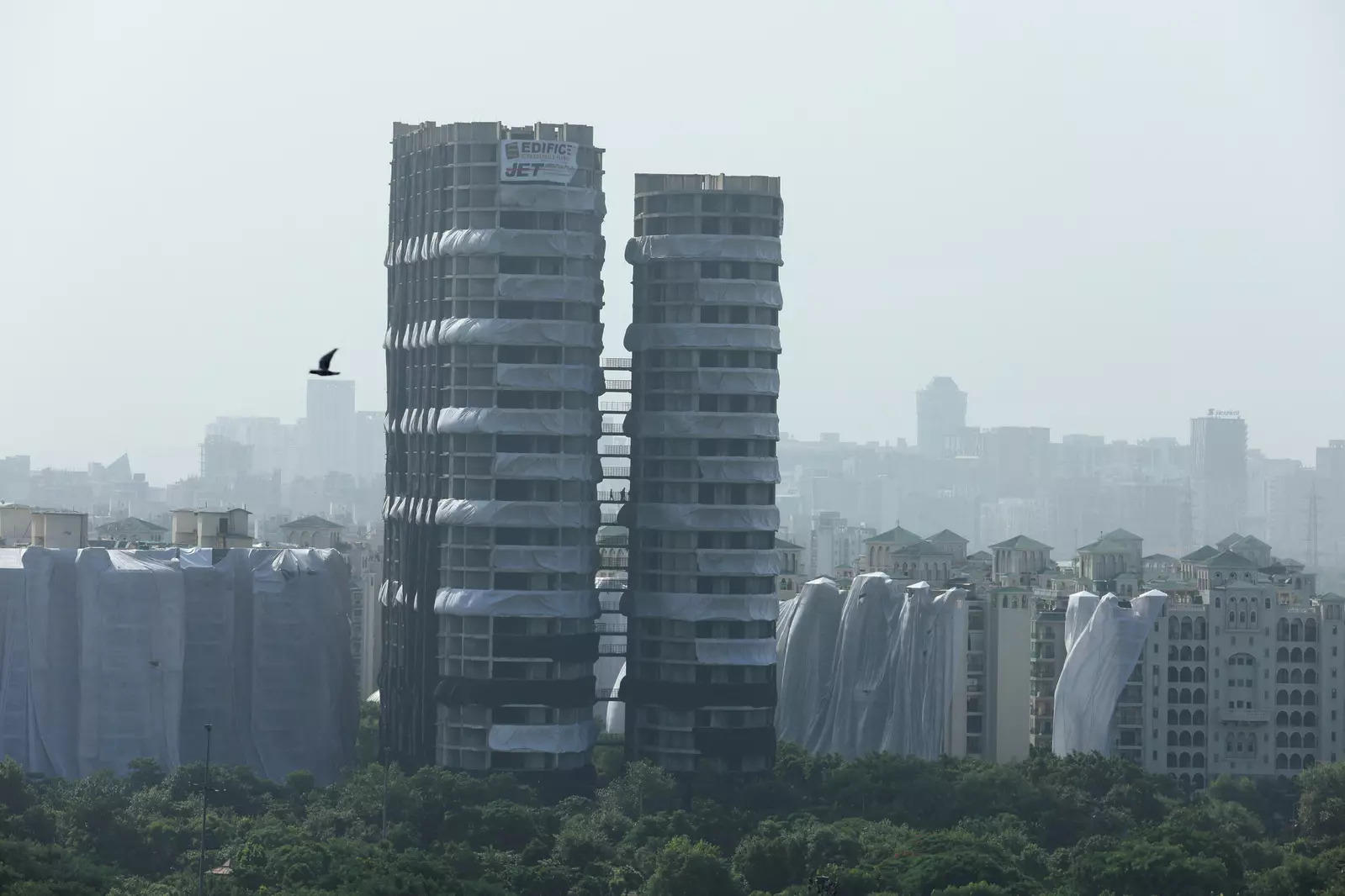 Plumes of dust as India demolishes illegal skyscrapers