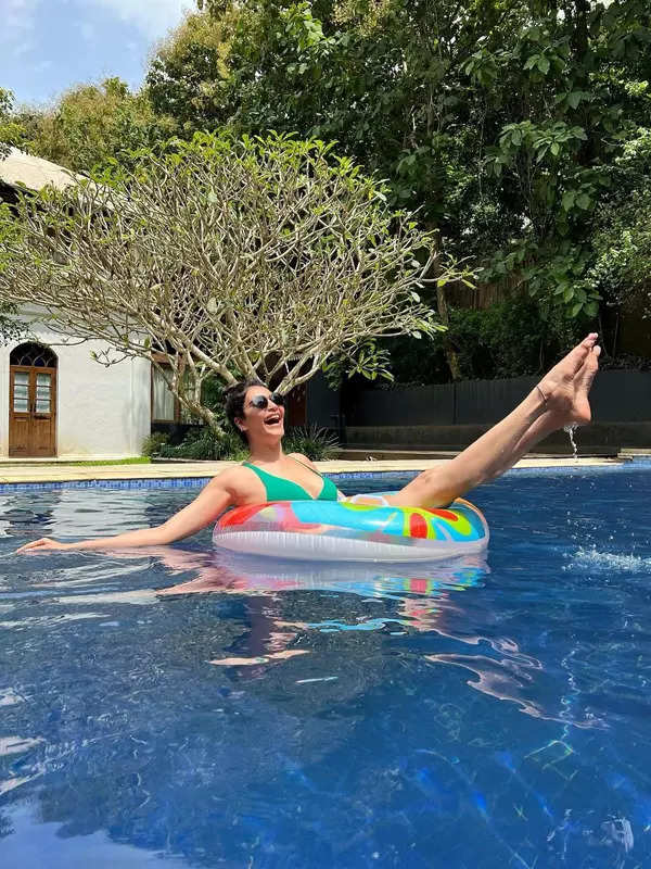 Karishma Tanna sets hearts racing as she chills in the pool in green bikini
