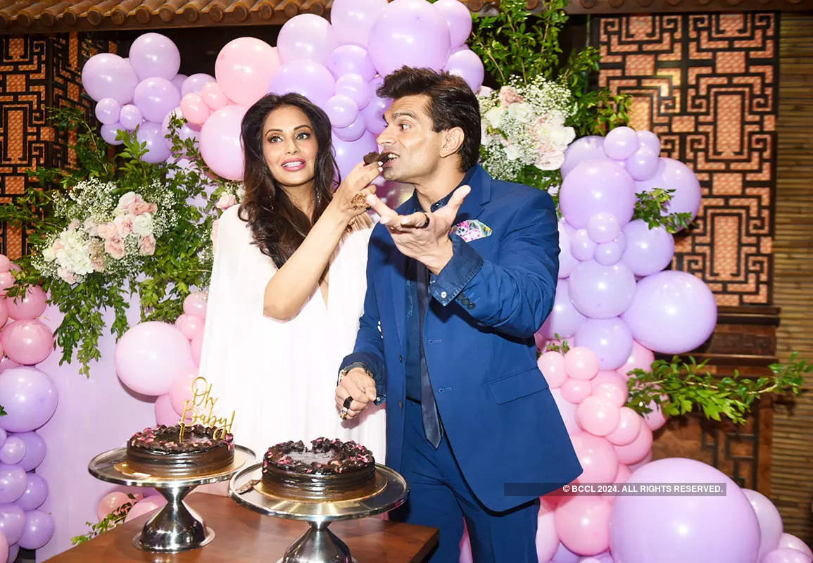 Unmissable pictures of Bipasha Basu with Karan Singh Grover from her dreamy pink-themed baby shower