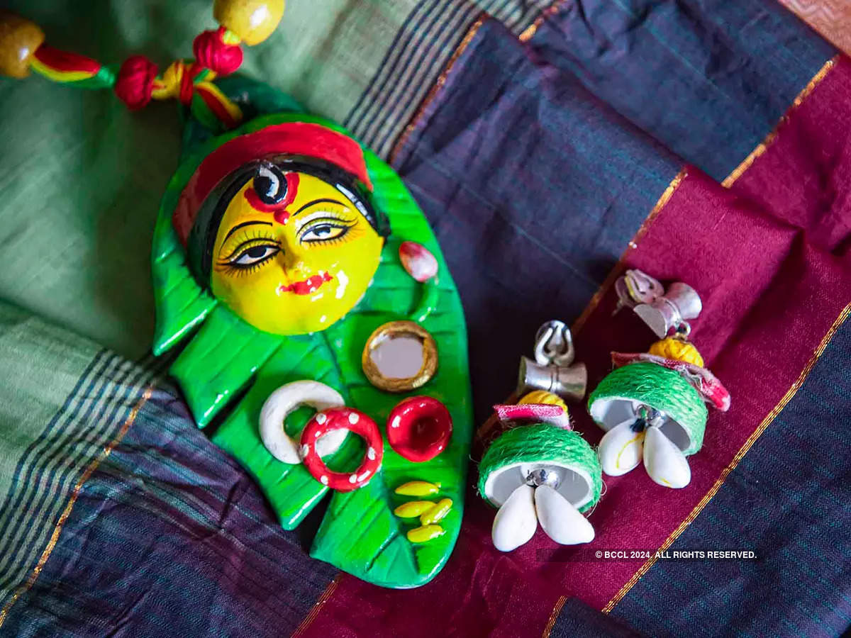 Rituparna Sengupta paired her parrot green sari with statement terracotta pendant and earrings