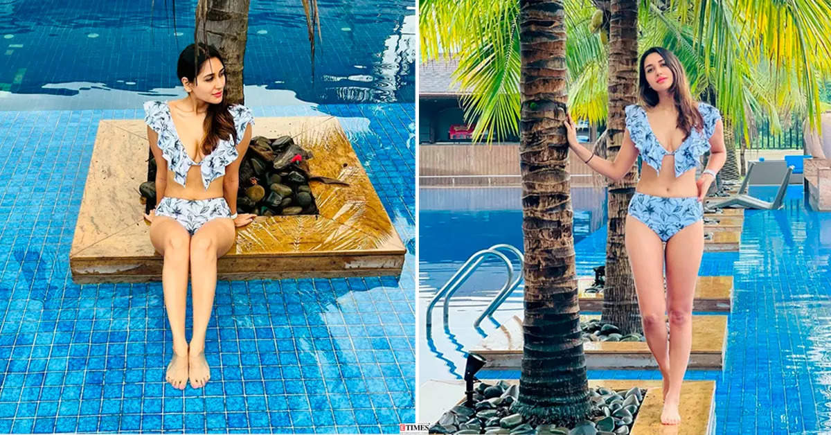 Bikini-clad Nikita Dutta sets hearts racing as she chills by the pool