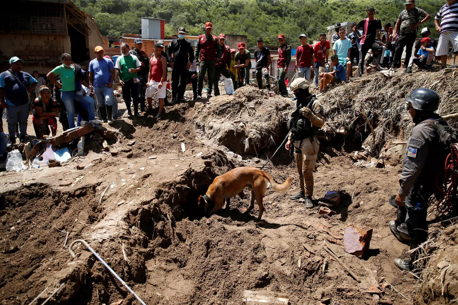 Venezuelans intensify search operation for missing persons as death toll rises; see pics