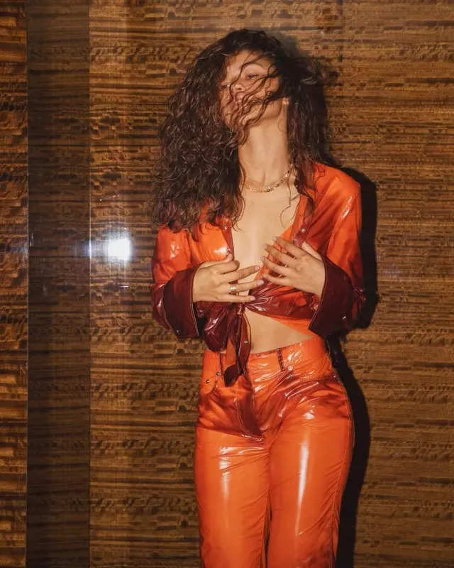 Zendaya looks fiery in an orange leather co-ord set and the internet can't keep calm, see pictures