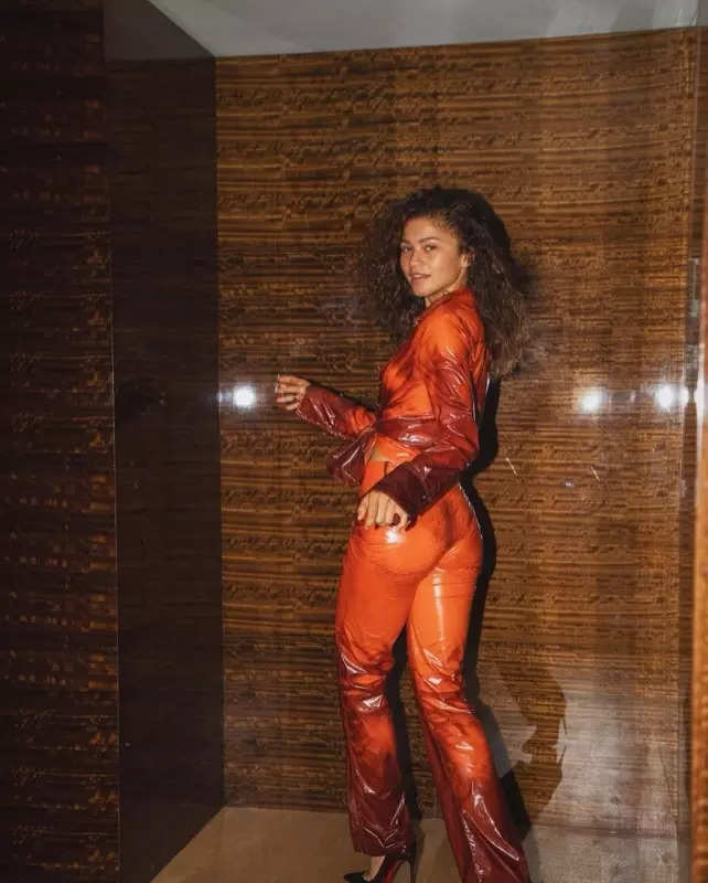 Zendaya looks fiery in an orange leather co-ord set and the internet can't keep calm, see pictures