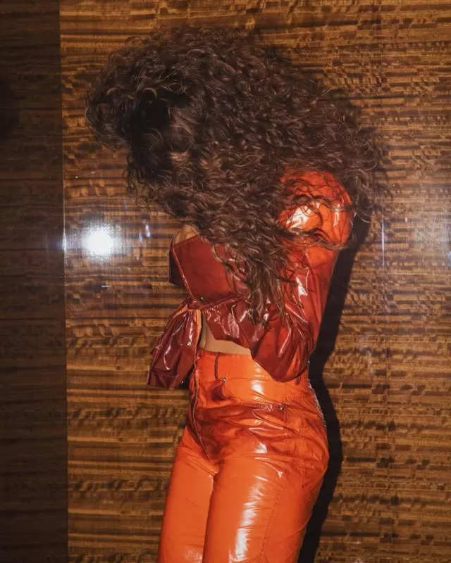 Zendaya looks fiery in an orange leather co-ord set and the internet can't keep calm, see pictures