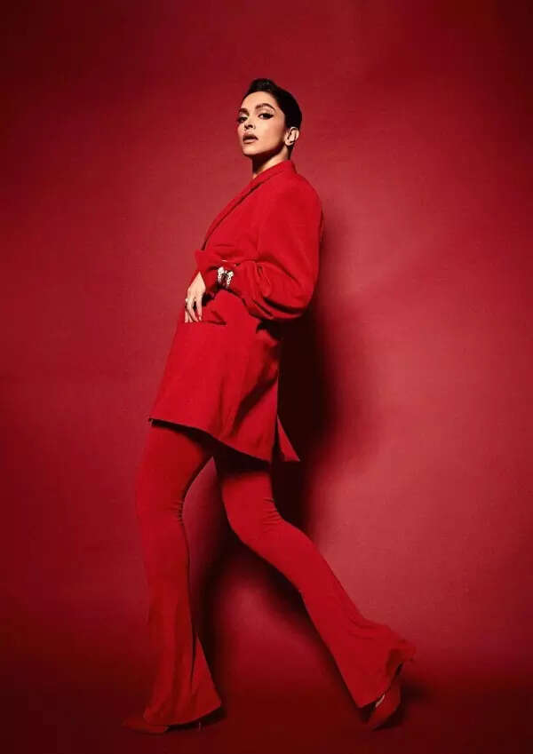 Deepika Padukone commands attention in a fiery red power suit, see pictures