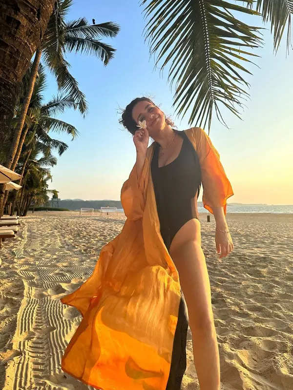 Aisha Sharma raises temperatures in a swimsuit and shrug as she holidays in Goa