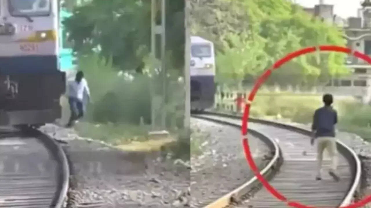 Watch: Man tries to block incoming train, gets slapped by train driver