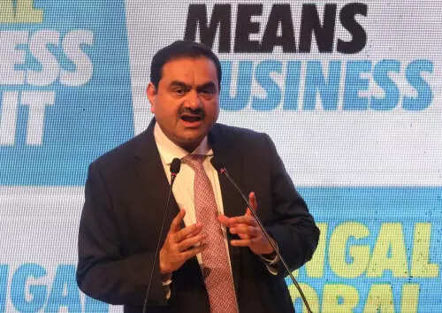 8. Who Adani credits for his group’s success?