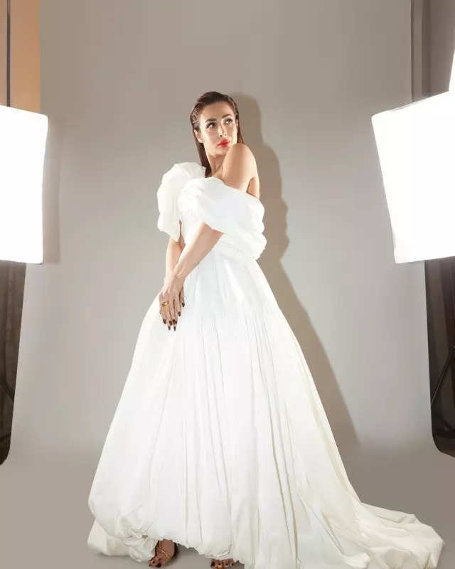 Malaika Arora drops head-turning pictures in multi-tiered dress