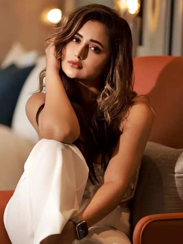 Rashami Desai is a vision to behold in a white bralette and matching pants, see pictures