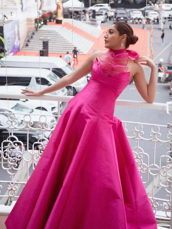 Surbhi Chandna brings drama to the frame in a pink gown on the streets of Vietnam