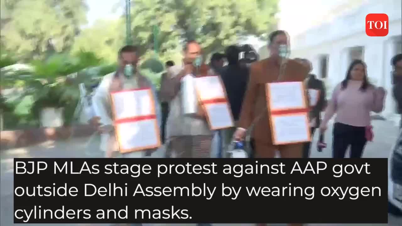 Poor air quality: BJP MLAs protest against AAP govt, hang oxygen ...