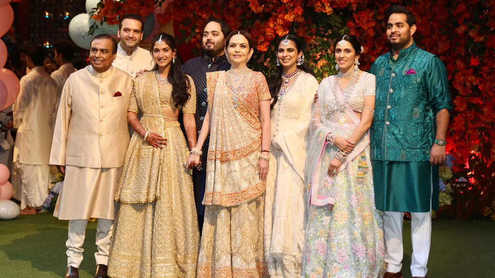 Radhika Merchant & Anant Ambani pose for the paps on their engagement day