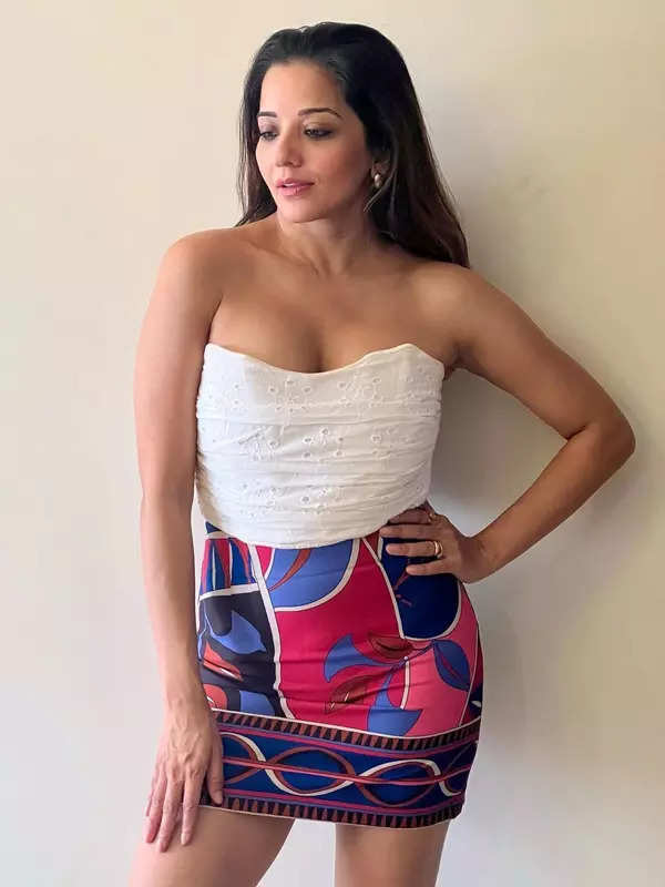 Monalisa sets hearts racing in a white crop top and printed skirt