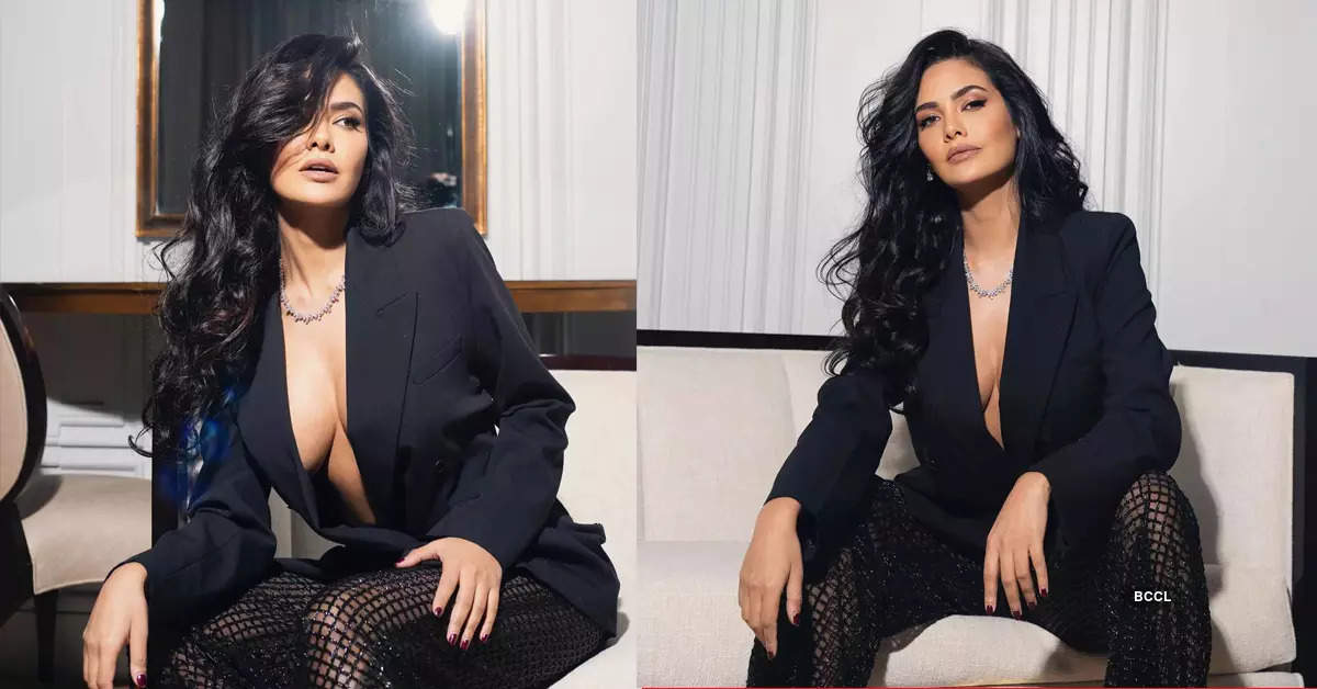 Esha Gupta stuns in just a blazer and netted trouser; netizens compare her to Kylie Jenner