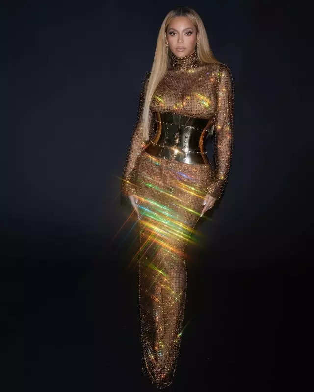 Beyonce is a goddess in sparkling sheer gold dress, pictures will make your jaws drop