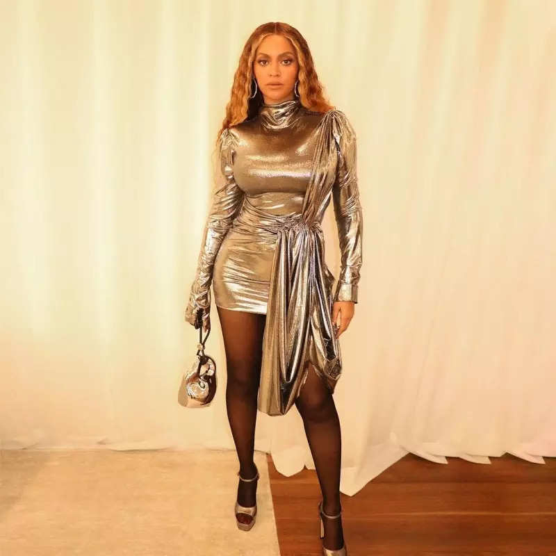 Beyonce is a goddess in sparkling sheer gold dress, pictures will make your jaws drop