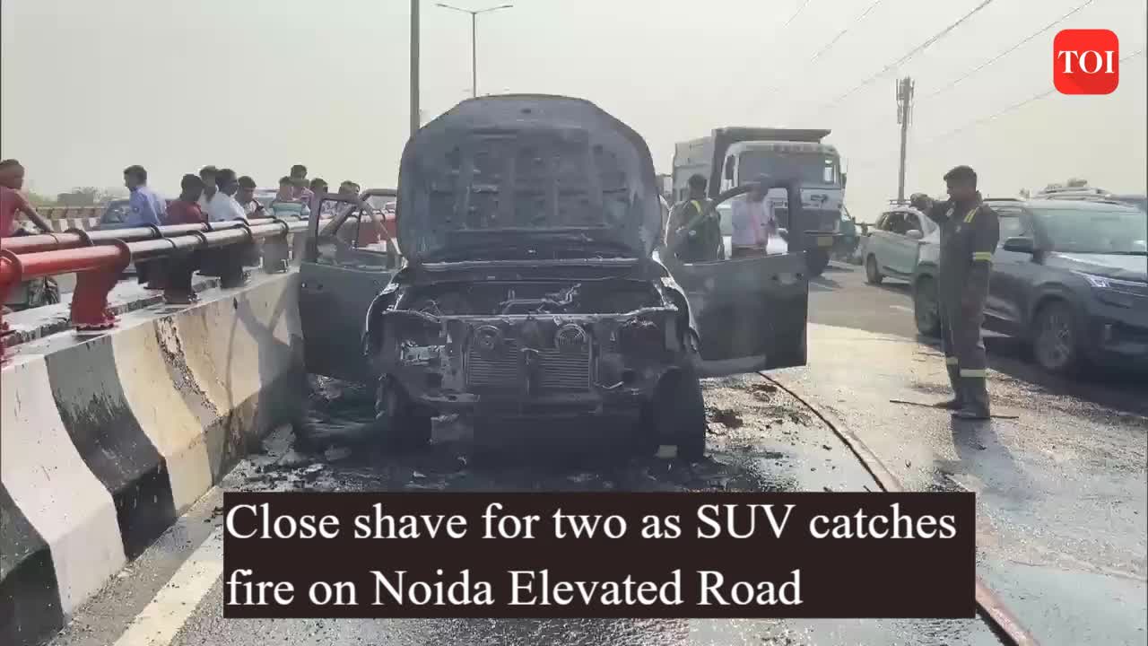 Close shave for two as SUV catches fire on Noida Elevated Road