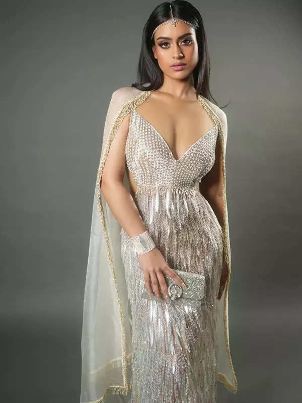 Nysa Devgan is a vision to behold in silver gown with plunging neckline and cape at NMACC Gala