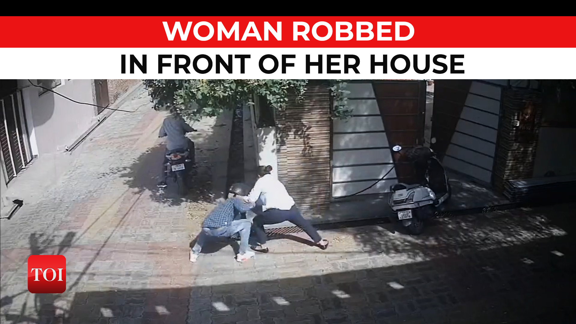 Caught on cam: Woman robbed of gold chain at gunpoint in UP capital Lucknow
