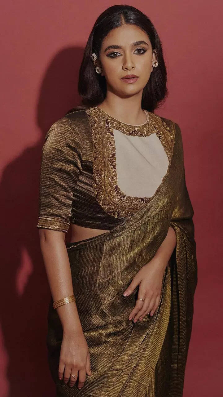 Keerthy Suresh exudes desi vibes in bronzed pleated saree