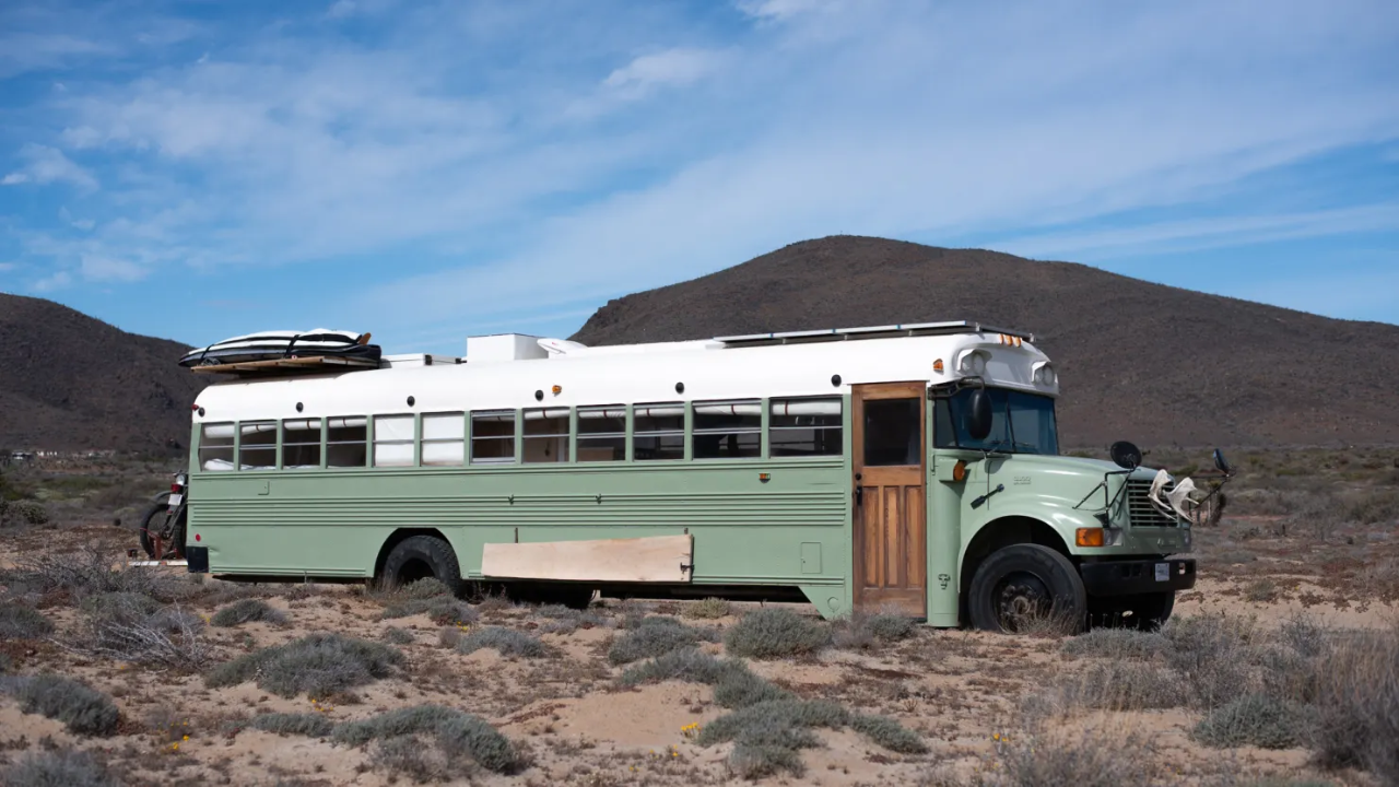 Couple turns an old school bus into a home built for travelling<br>