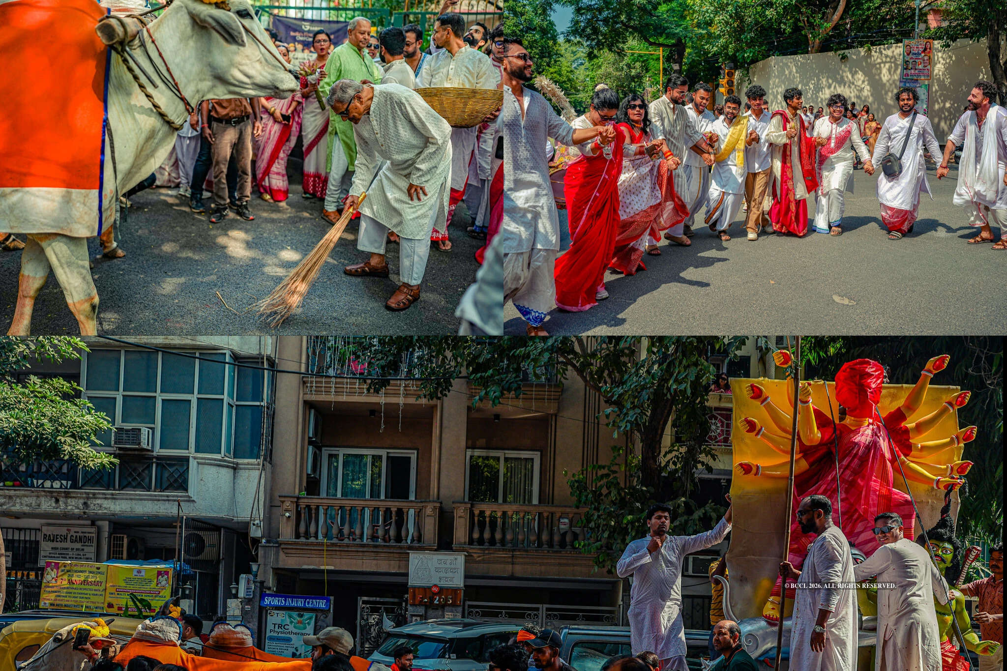 Dressed in red and white, members of the Durgotsab GK2 community welcomed Maa with gusto